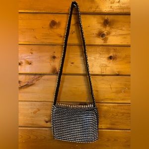 Excellent like-new pre-owned condition Escama Brasil bottle tab crossbody purse